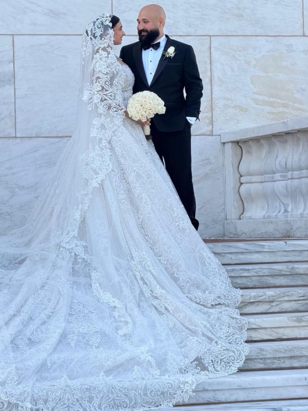 Elegant Lace half
-Sleeve White Bridal Gown with Cathedral Train